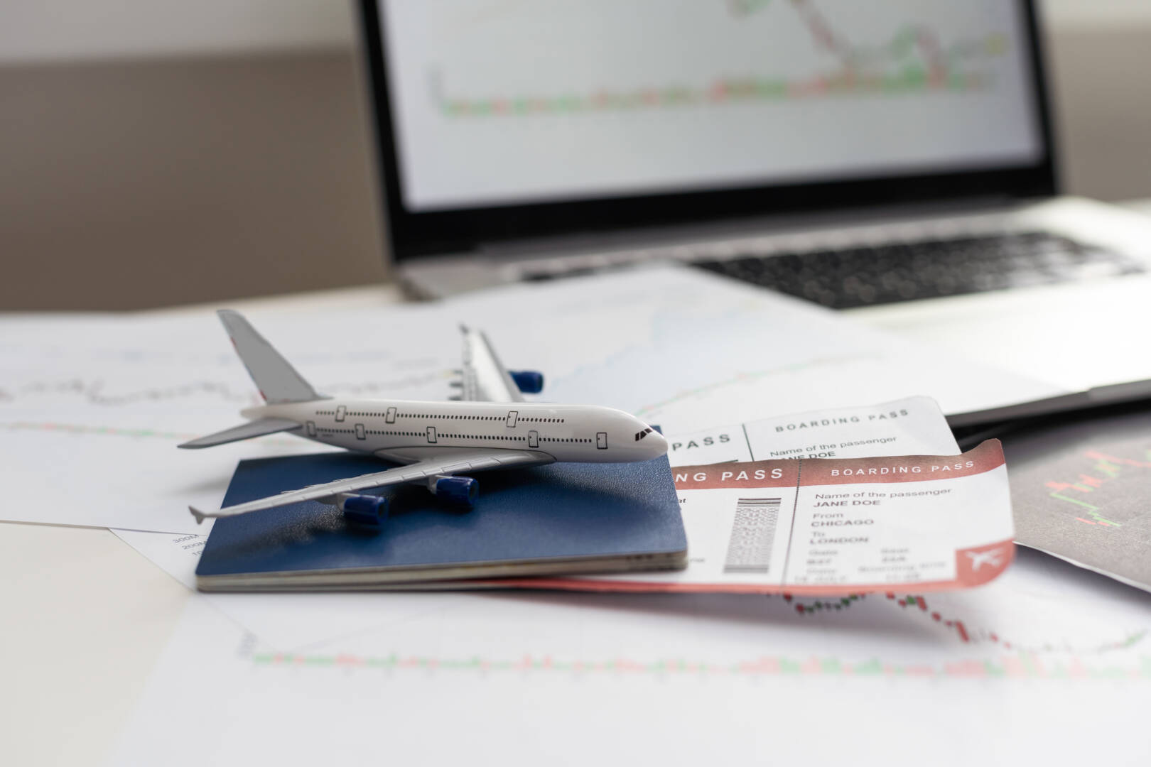Airplane and money. Plane on the background of USA dollars. The cost of travel, air tickets and flights, financial expenses for vacation.